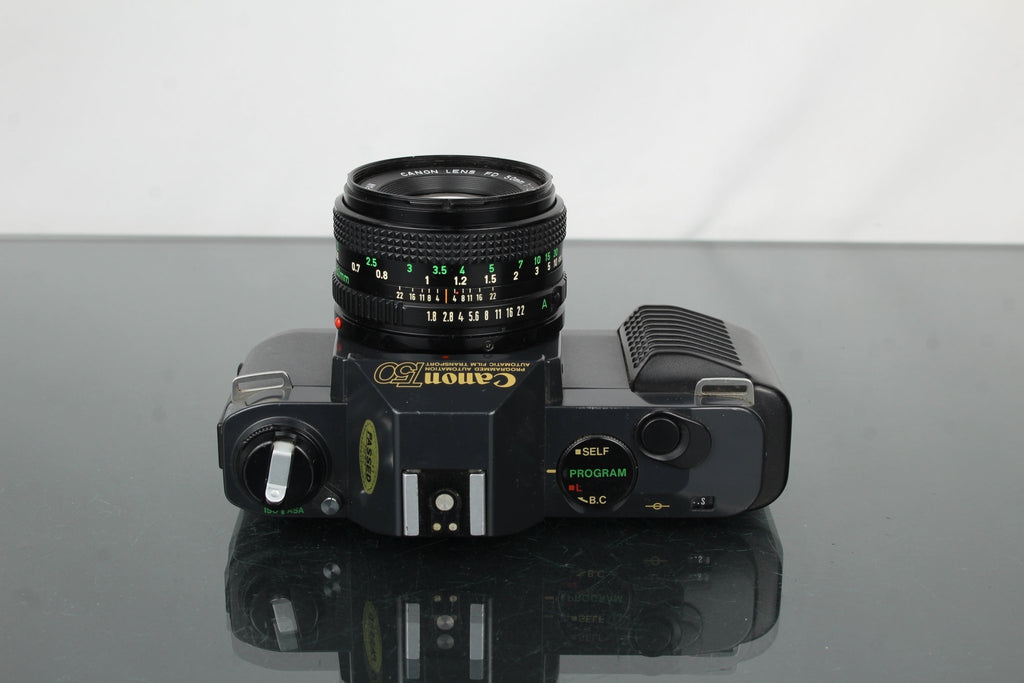 Canon T50 + 50mm 1.8 Canon FD lens - Dutch|Thrift