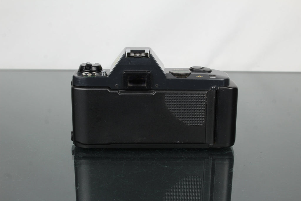 Canon T50 + 50mm 1.8 Canon FD lens - Dutch|Thrift